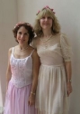 Stephanie Bennett (L) and flutist dressed for a party