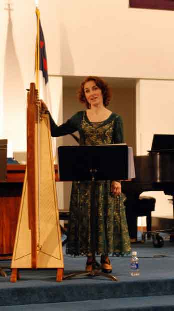 performing on Celtic harp
