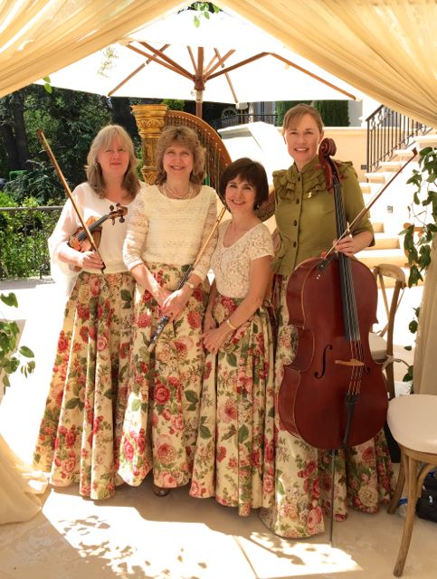 quartet in floral skirts